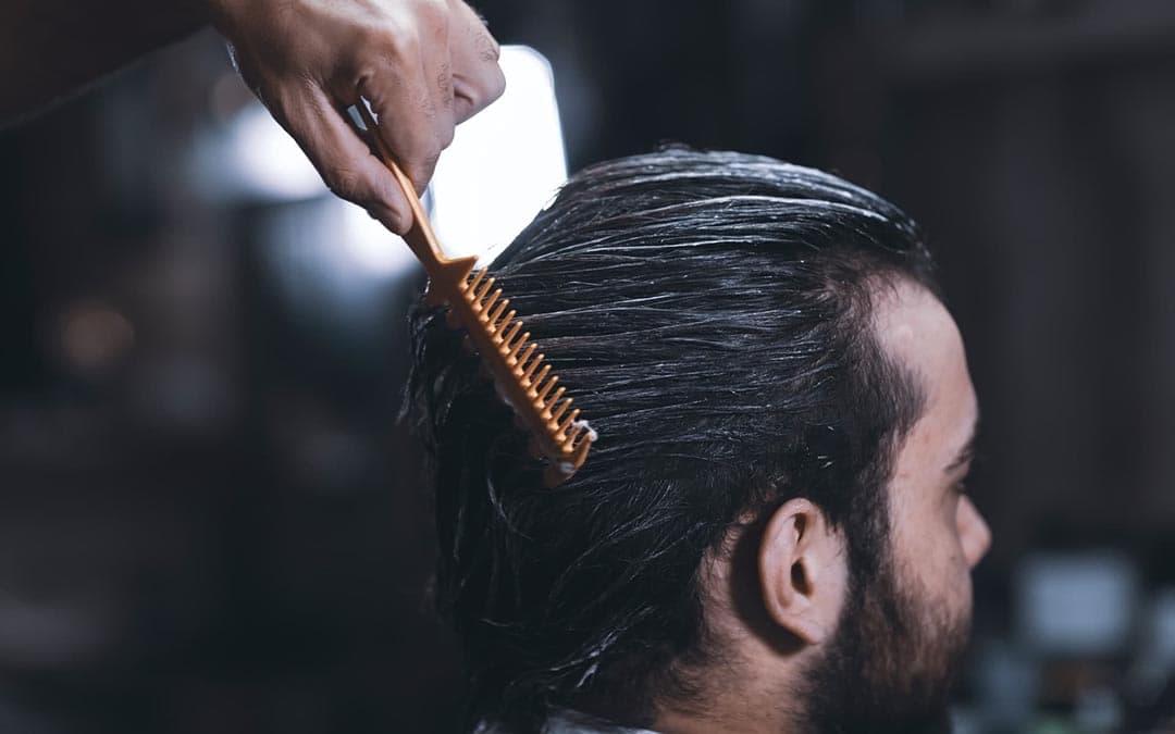 Man with full head of hair using topical finasteride Canada