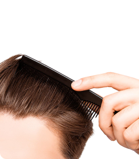 close up view of man combing his hair