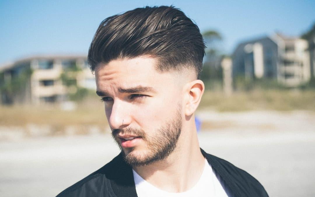 Man on beach, hair loss in men